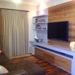 Sala de TV em Residência por Arquitetos